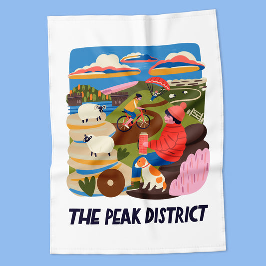 Tea towel with colorful illustration of people in the Peak District on a blue background